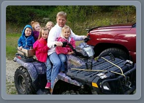 Grandpa Mire with the Grandkids on ATV